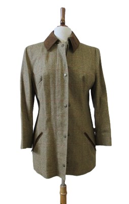 Lot 139 - A tweed jacket by Gumleaf, the brown wool...