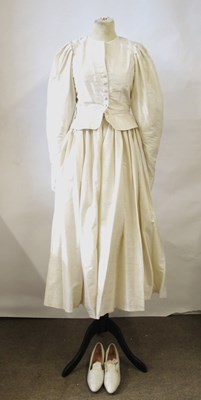 Lot 55 - A Droopy Browns cream silk wedding ensemble,...