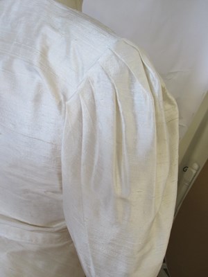 Lot 55 - A Droopy Browns cream silk wedding ensemble,...