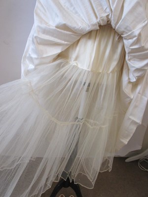 Lot 55 - A Droopy Browns cream silk wedding ensemble,...