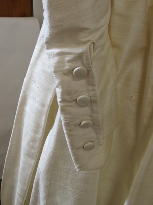 Lot 55 - A Droopy Browns cream silk wedding ensemble,...