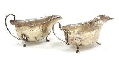 Lot 65 - Two hallmarked silver sauce boats of typical...