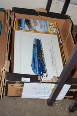 Lot 592 - One box of Hornby train magazines and a framed...