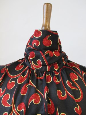 Lot 54 - Yves Saint Laurent Variation: a 1980's knee...