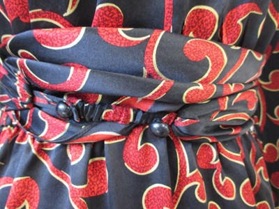 Lot 54 - Yves Saint Laurent Variation: a 1980's knee...