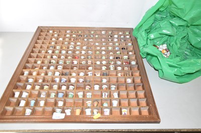 Lot 539 - A large rack of collectors thimbles