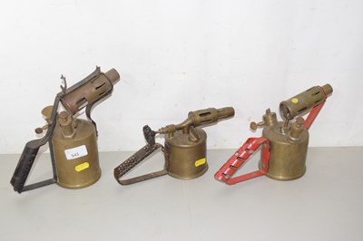 Lot 541 - Three vintage blow lamps
