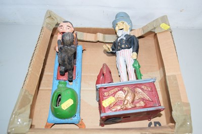 Lot 562 - Two reproduction novelty cast iron money boxes