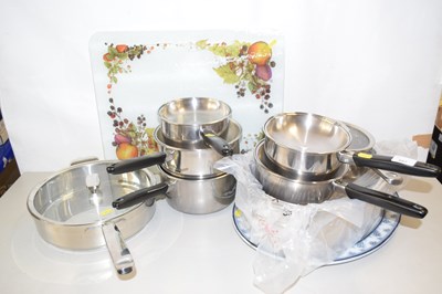 Lot 657 - Group of various steel saucepans and other...