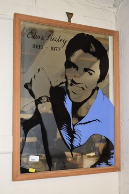 Lot 689 - A framed mirror picture of Elvis Presley