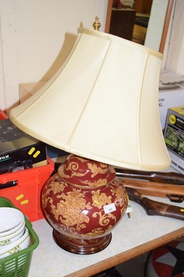 Lot 705 - A globular lamp base and shade