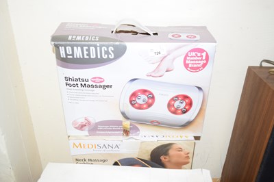 Lot 726 - A pair of boxed massage machines