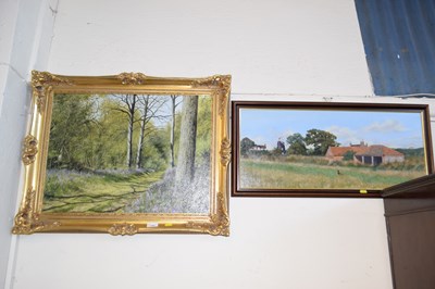 Lot 754 - An oil painting of a bluebell wood signed J...