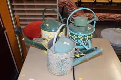 Lot 813 - A group of four painted watering cans