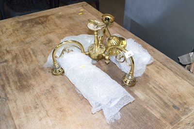 Lot 822 - A brass three branch ceiling light fitting