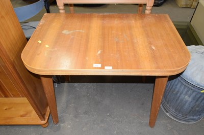 Lot 831 - A retro walnut veneered dining table with...