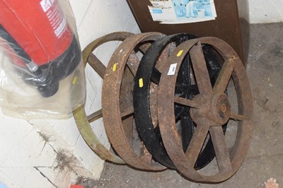 Lot 860 - Four vintage iron wheels
