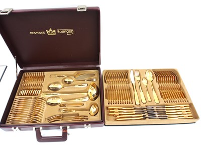 Lot 215 - Cased Bestecke Solingen SBS vintage gold...