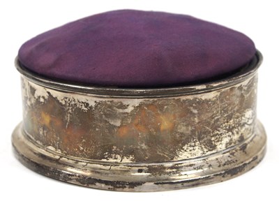 Lot 29 - A silver framed jewellery casket of circular...