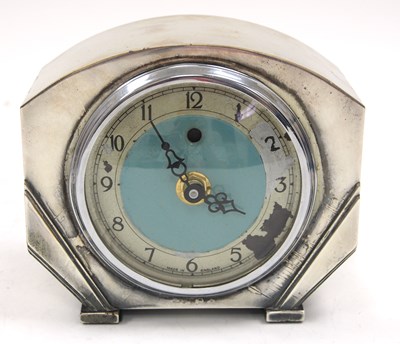 Lot 211 - A Smiths Art Deco silver plated cased mantel...