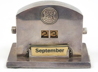 Lot 63 - A George V silver perpetual  desk calendar,...