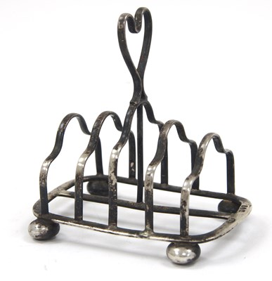 Lot 91 - A late Victorian small silver toast rack of...