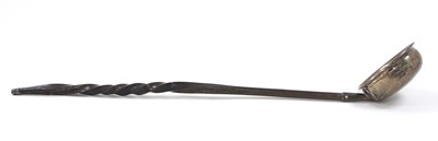 Lot 69 - A Georgian silver and baleen toddy ladle...