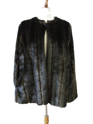 Lot 136 - Michael Kors: a faux fur cape, with side arm...