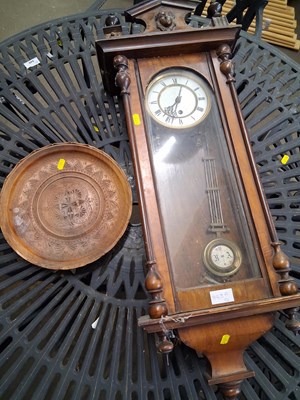 Lot 848A - A wooden wall clock and a carved wooden bowl