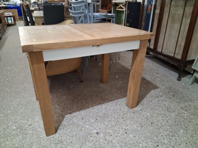 Lot 334A - A modern oak extending dining table