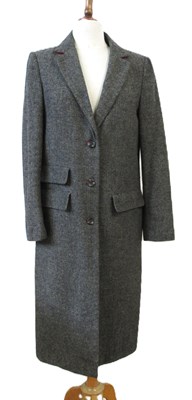Lot 133 - A wool tweed coat, single breast button front...