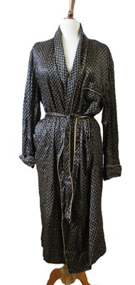 Lot 21 - A black patterned silk dressing gown, size S