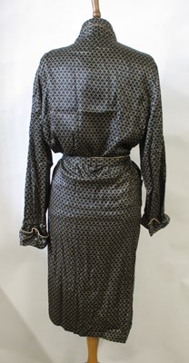 Lot 21 - A black patterned silk dressing gown, size S