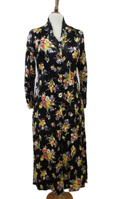 Lot 18 - A mid 20th century patterned black satin...