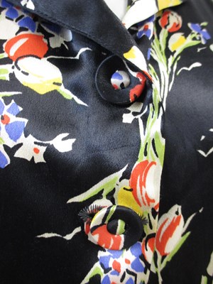 Lot 18 - A mid 20th century patterned black satin...