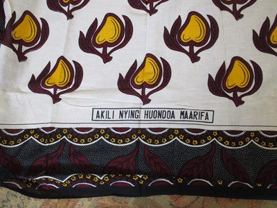 Lot 89 - A group of African textiles and kanga's, (5)