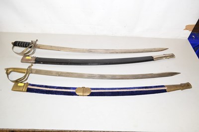 Lot 75 - A pair of reproduction swords