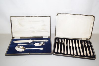 Lot 100 - A cased set of silver plated dessert knives...