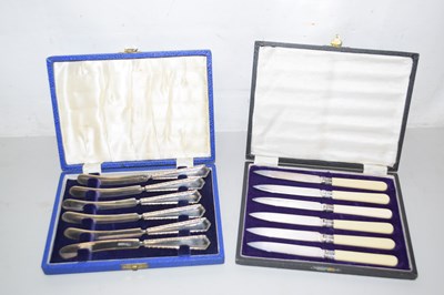 Lot 108 - Two cases of silver plated butter knives