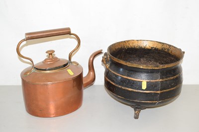 Lot 164 - An iron three footed cauldron type pot...