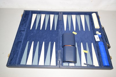 Lot 187 - A travelling back gammon set