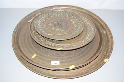 Lot 190 - A group of brass serving trays and wall...
