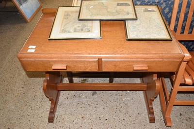 Lot 251 - A 20th Century oak veneered two drawer writing...
