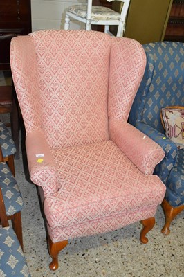Lot 265 - Wing back armchair