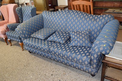 Lot 266 - A blue floral upholstered camel back sofa and...
