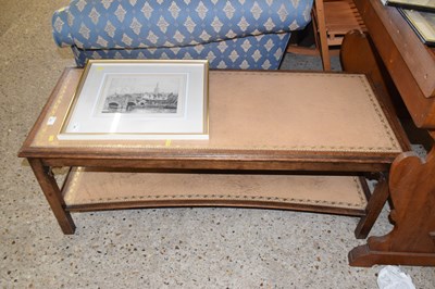 Lot 267 - A leather topped coffee table