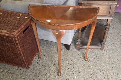 Lot 287 - A walnut veneered hall table