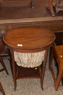 Lot 292 - An Edwardian sewing table with oval top...