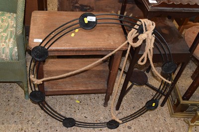 Lot 305 - An iron hanging tea light stand