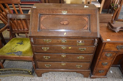 Lot 310 - An 18th Century oak and inlaid bureau with...